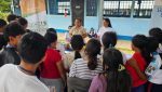 Jóvenes del caserío El Caoba en Poptún, Petén, participando en la jornada informativa sobre nutrición y hábitos alimenticios saludables.