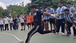 Estudiantes participando en competencias de atletismo y actividades físicas dentro de las instalaciones del Campo Marte